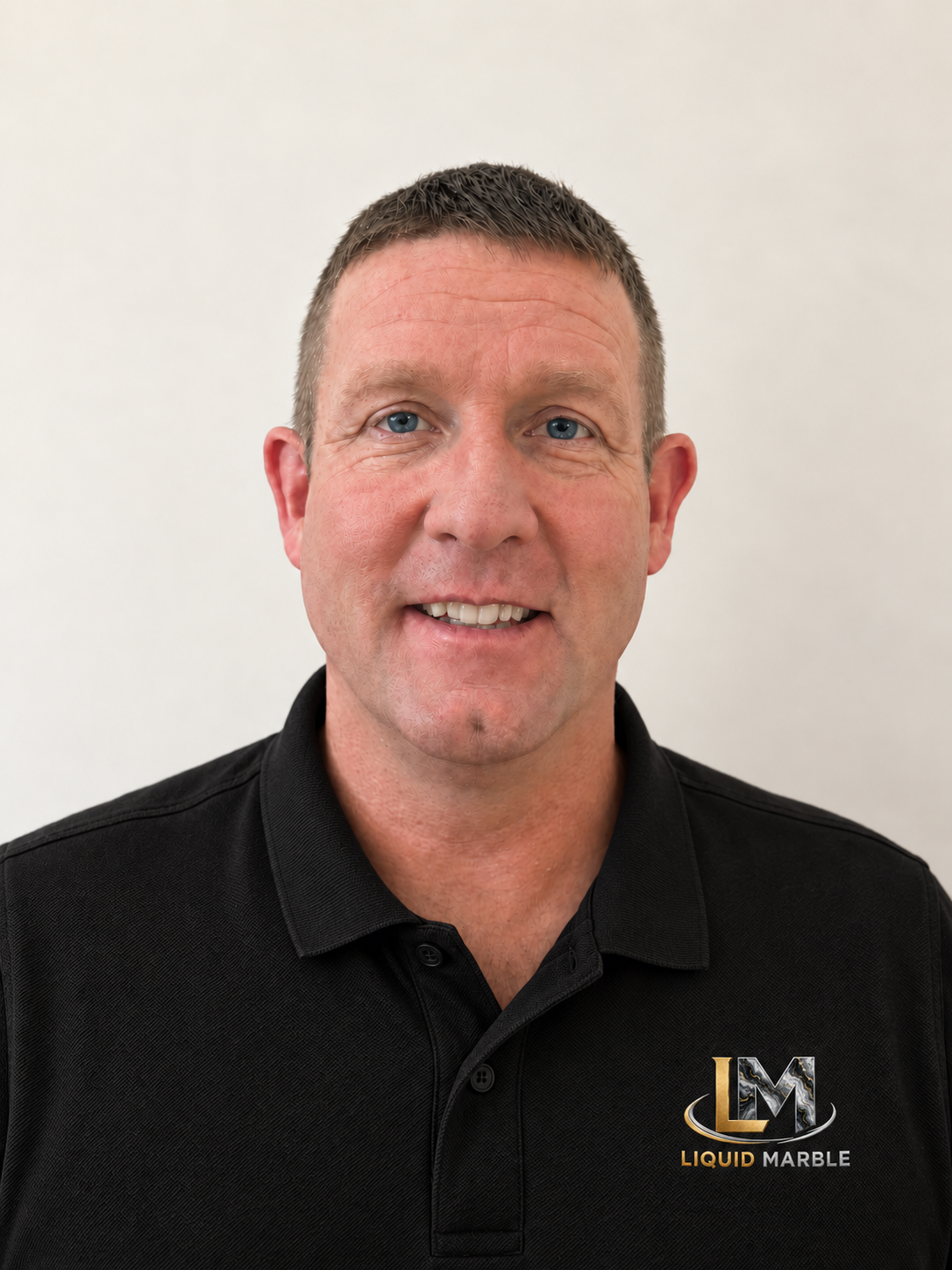 Dan Alford wearing his Liquid Marble polo shirt