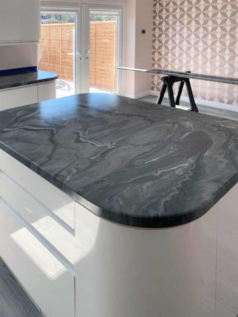 Dark grey marble-effect resin island worktop